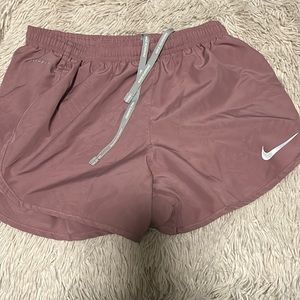 Muted pink Nike shorts